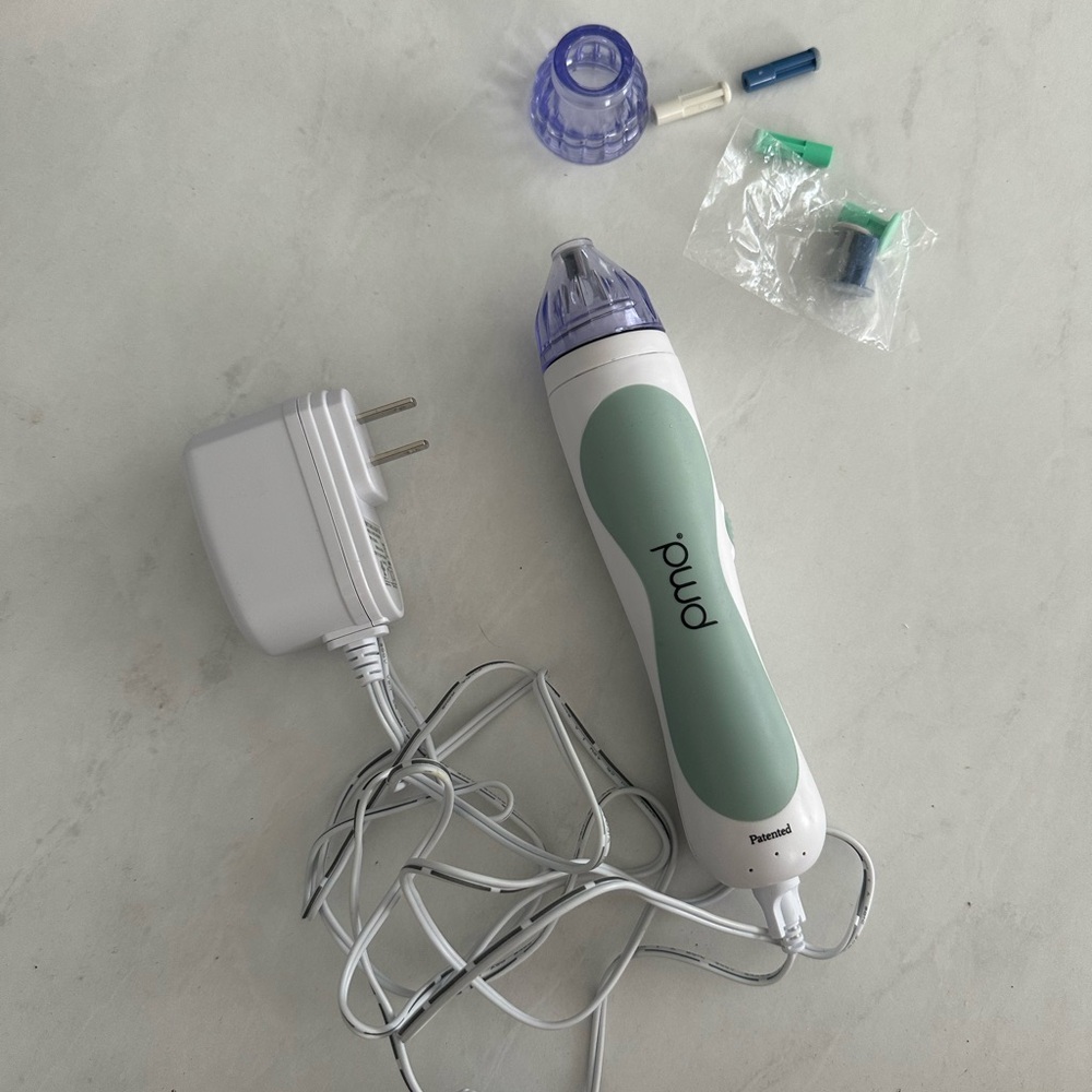 PMD Pro Green and White Skincare Device with Charger
